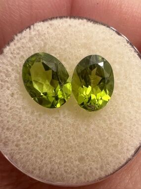 3.87 vs genuine peridot pair in gem container